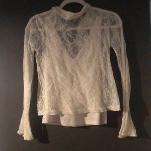 Lace high neck blouse with satin attached undertop